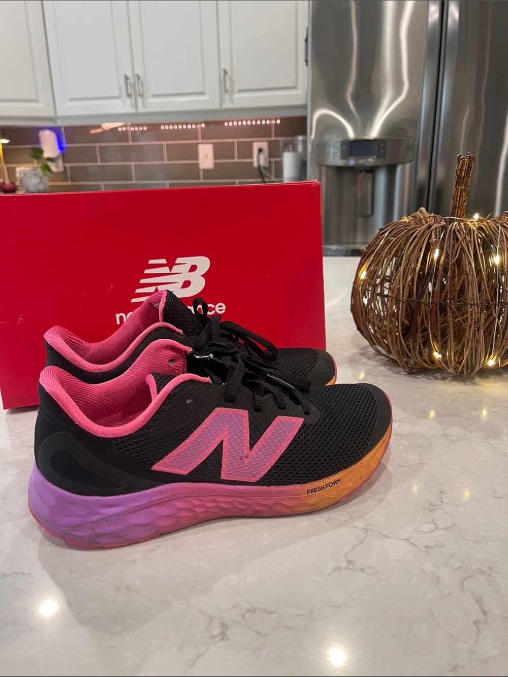 New Balance Kids Black Sneakers with Pink & Orange Gradient Midsole